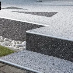 Nowoczesne schody z kamiennego dywanu. Estetyczny kamienny dywan koszt 1m2 to inwestycja w trwałość i styl.