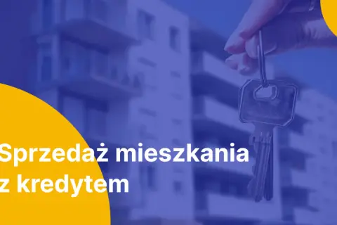 Klucze do mieszkania z kredytem w tle nowoczesnego bloku. Sprzedaż mieszkania z kredytem staje się prostsza.